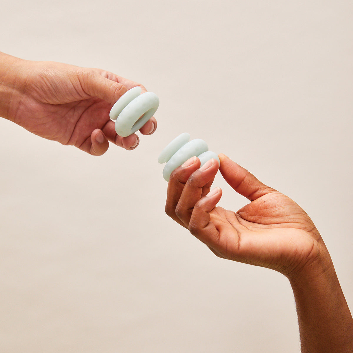 Ohnut Set of 3 Wearable Penetration Adjustment Penis Rings being demonstrated with hands