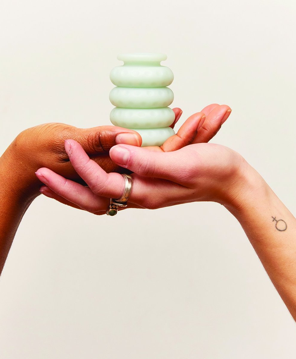 Ohnut Set of 3 Wearable Penetration Adjustment Penis Rings held in 2 hands