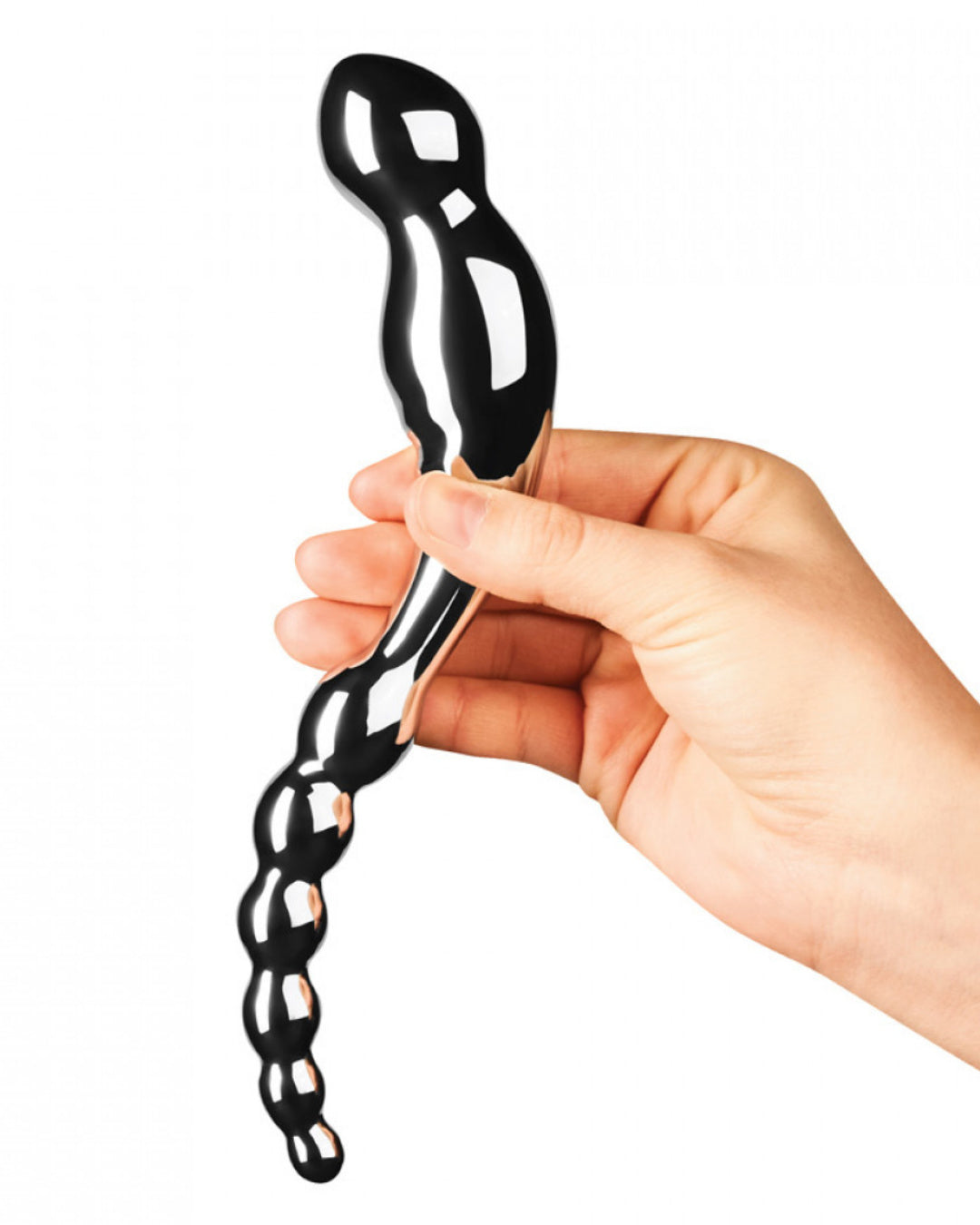 Le Wand Swerve Double Ended Stainless Steel Dildo held at the center by a person's hand to illustrate the size of the dildo