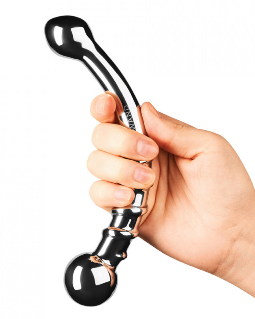 Le Wand Bow Double Ended Stainless Steel Dildo held at the center by a person's hand to illustrate the size of the dildo