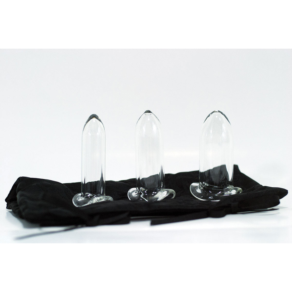 Crystal Delights Glass Dilator Set of 3  standing on storage bag