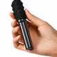 Le Wand Chrome Grand Bullet Waterproof Rechargeable Metal Bullet with Texture Sleeve - Black being held