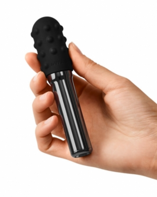 Le Wand Chrome Grand Bullet Waterproof Rechargeable Metal Bullet with Texture Sleeve - Black being held