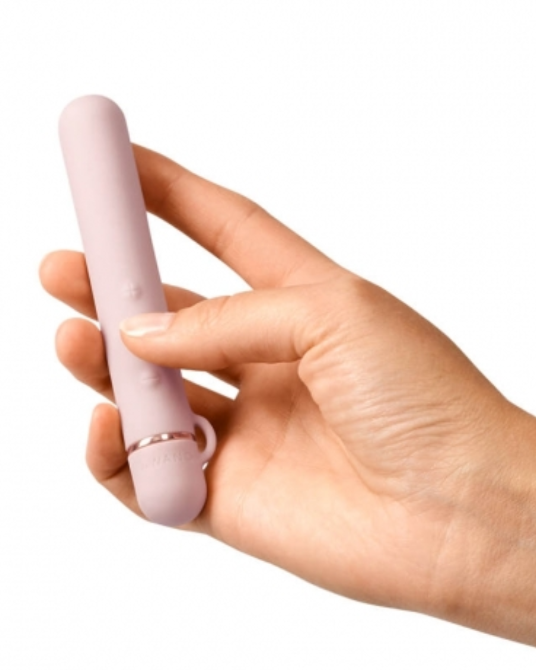 Le Wand Baton Slim Rechargeable Waterproof Vibrator - Rose Gold held in a h and