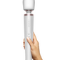Le Wand Cordless Vibrating Massager - White held in a person's hand to show the size