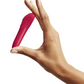 We-Vibe Tango X Powerful Bullet Vibrator - Cherry Red held in a woman's hand