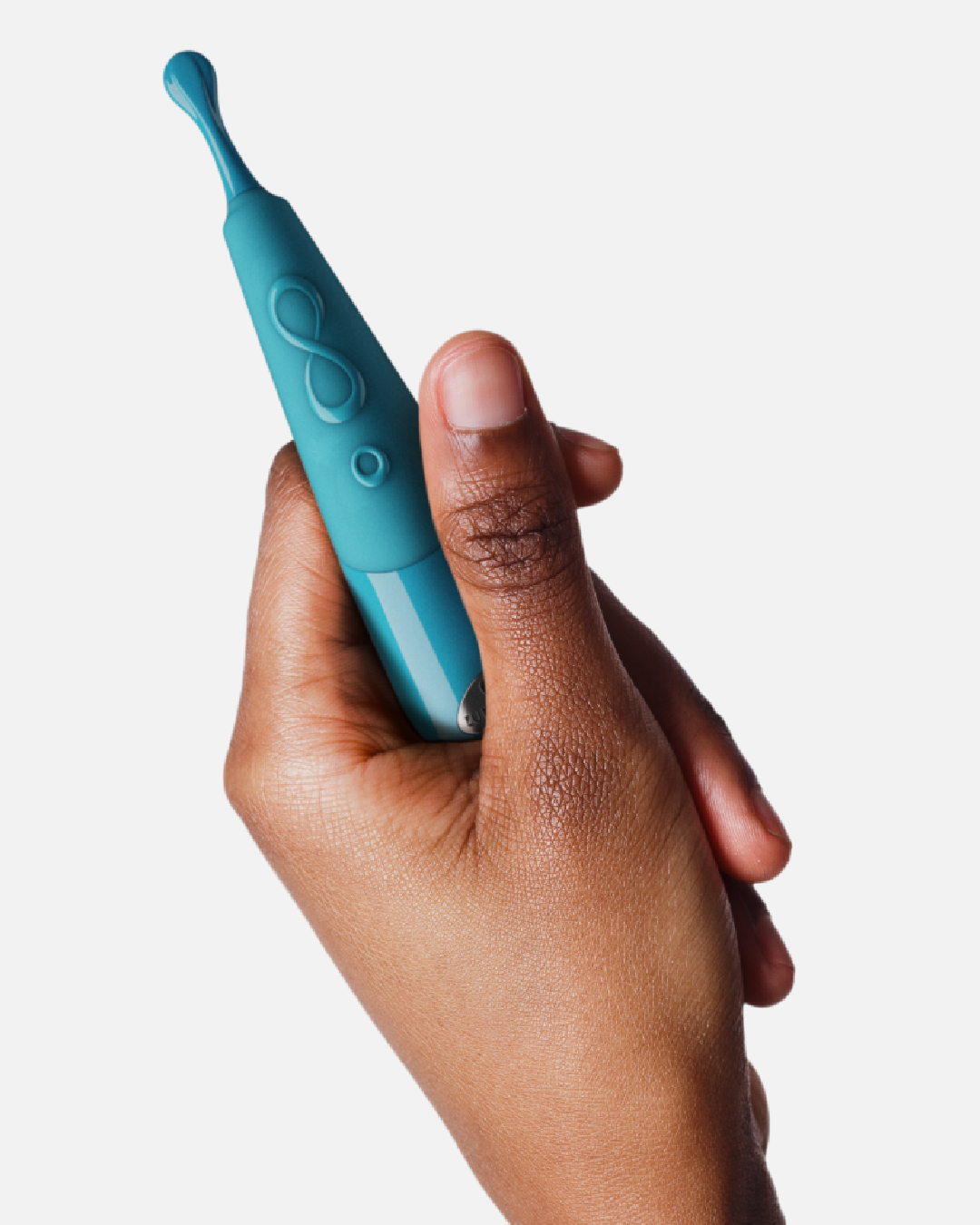 Zumio i - Rechargeable Clitoral Stimulator -Teal in model's hand 