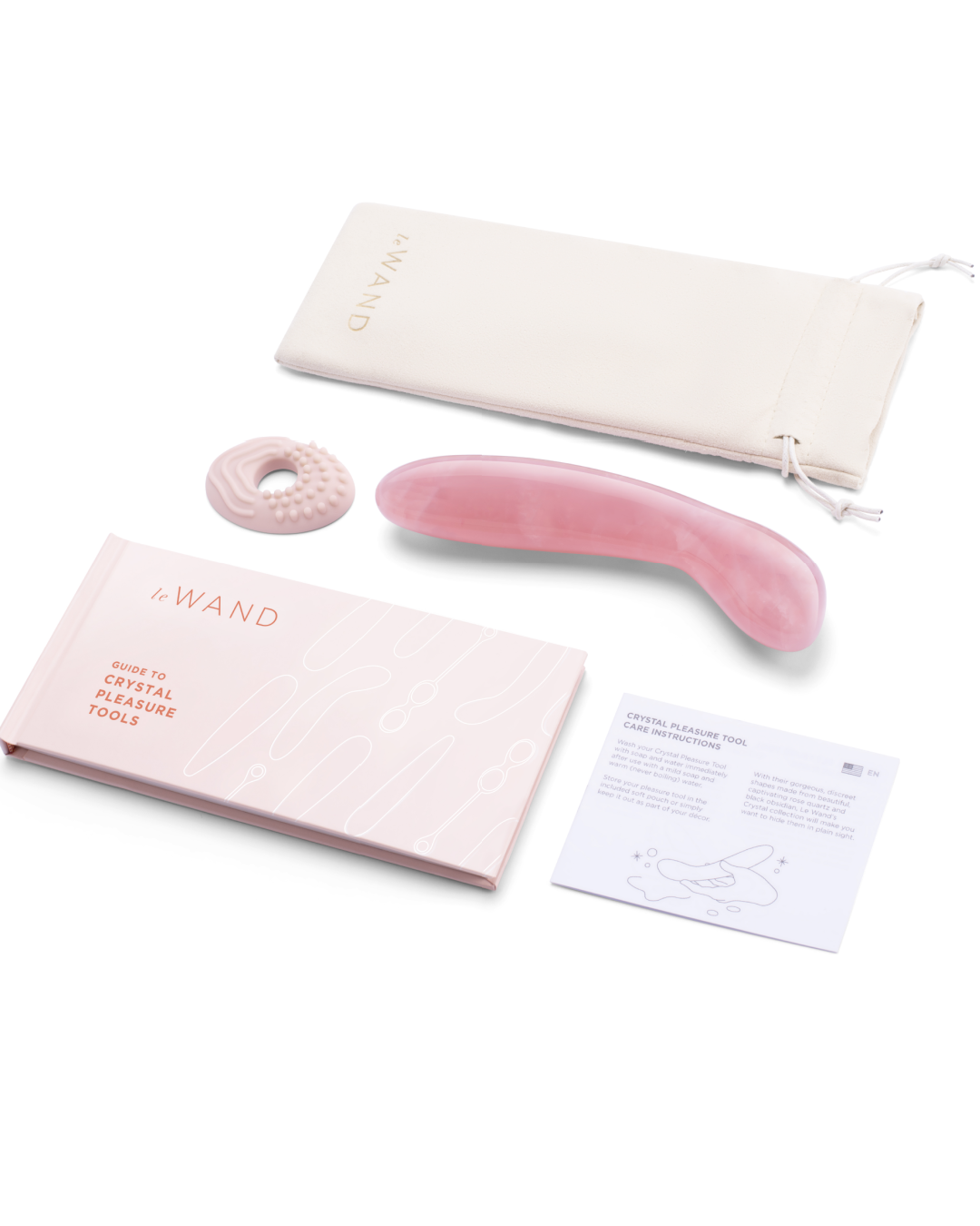 Le Wand Crystal G Spot Wand - Rose Quartz next to silicone ring, storage pouch and user manual 