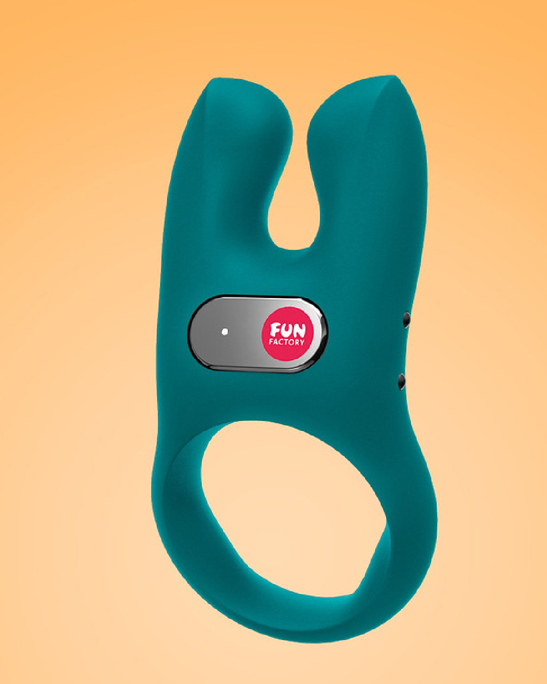 Fun Factory NŌS Vibrating Couples Penis Ring - Blue ANGLED SIDE VIEW ON YELLOW BACKGROUND